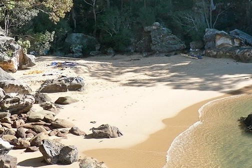 a group of people on a rock