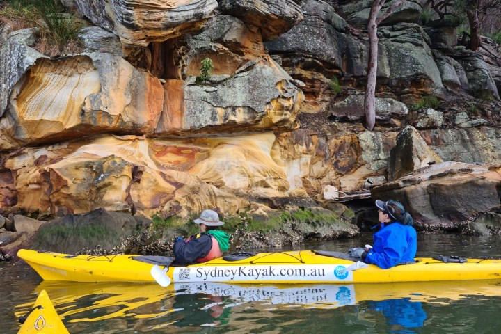 a raft next to a pool of water