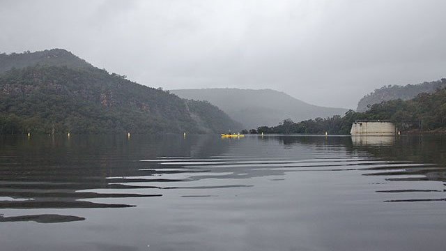 a small boat in a body of water