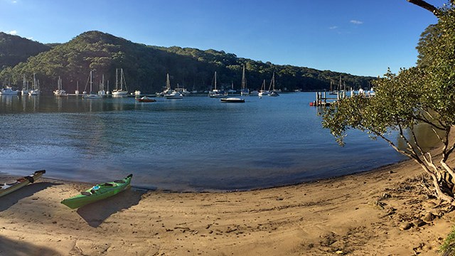 a boat sitting on top of a beach