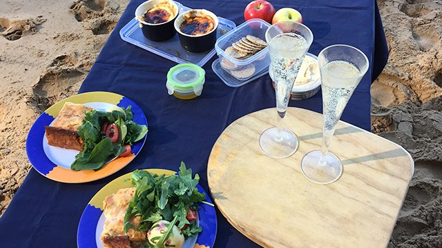 a plate of food on a picnic table